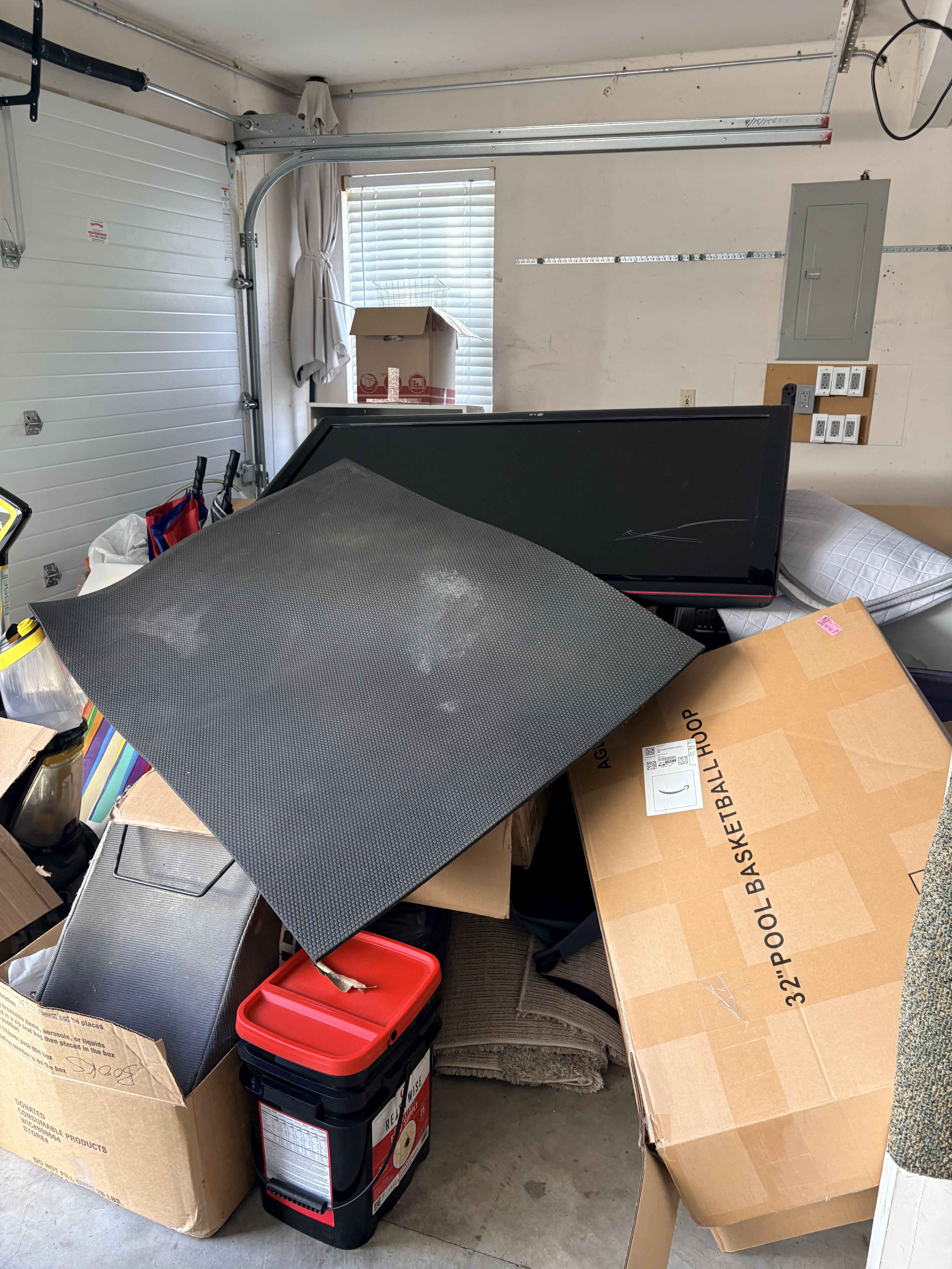 Packed garage ready for cleanout, O'Fallon, MO